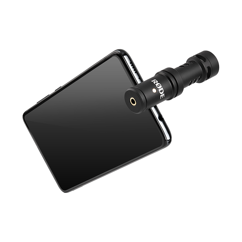Rode Videomic Me Rode compact external microphone attached to a black smartphone.