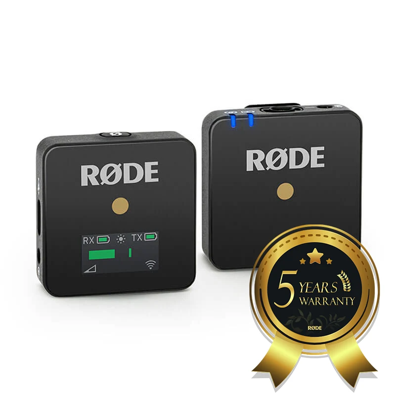 Rode Wireless Go Røde wireless microphone system with two black compact units; one displays rx/tx and battery indicators.