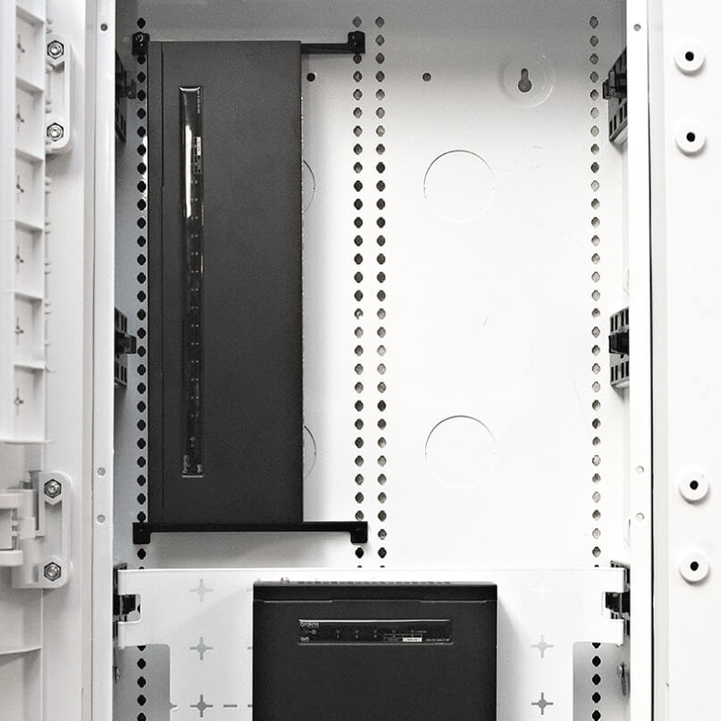 Araknis Networks 110 Series Unmanaged+ Gigabit 16 Port Compact Switch Powered By Poe Rack-mounted server chassis with black front panel and drive bays inside a white server cabinet.