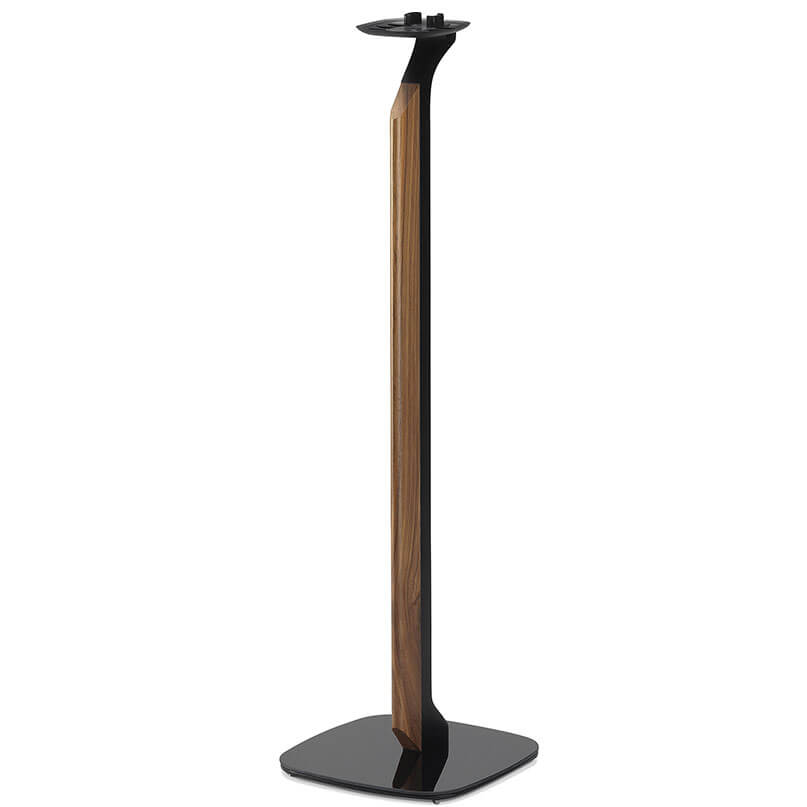 Flexson Adjustable Floor Stand For Sonos Play:1/One Floor-standing speaker stand with wood veneer panel, black metal frame, and circular top mounting plate on a square base.