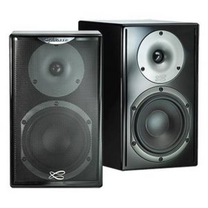 Two Cabasse Surf Bookshelf Speakers in black are shown—one facing forward with a protective mesh cover, and the other angled to display the exposed speaker drivers.