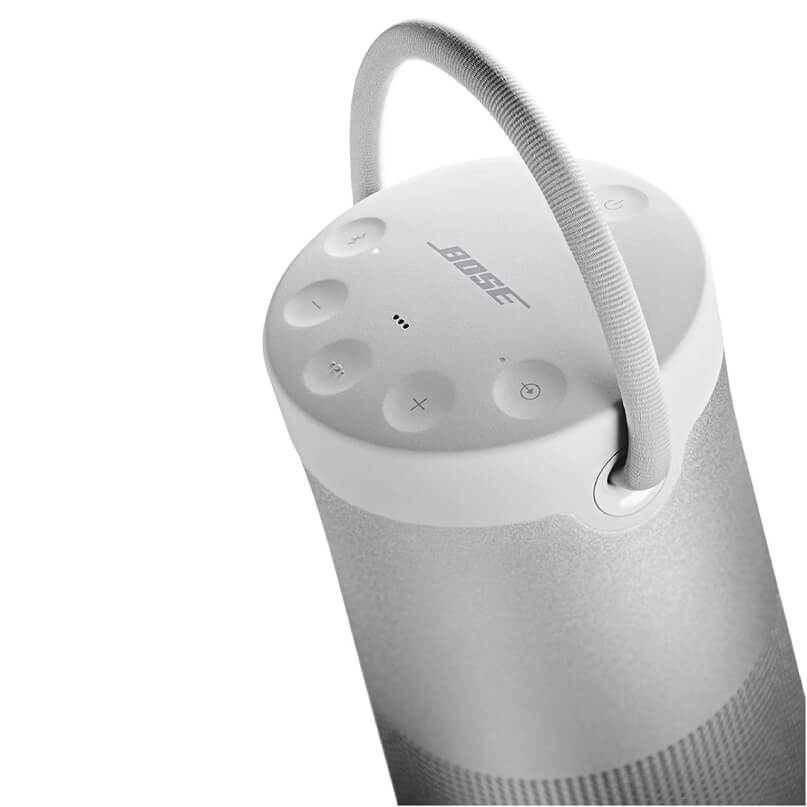 Bose Soundlink Revolve+ Bluetooth Speaker Bose portable wireless speaker with gray fabric body, white top, and built-in carry handle.