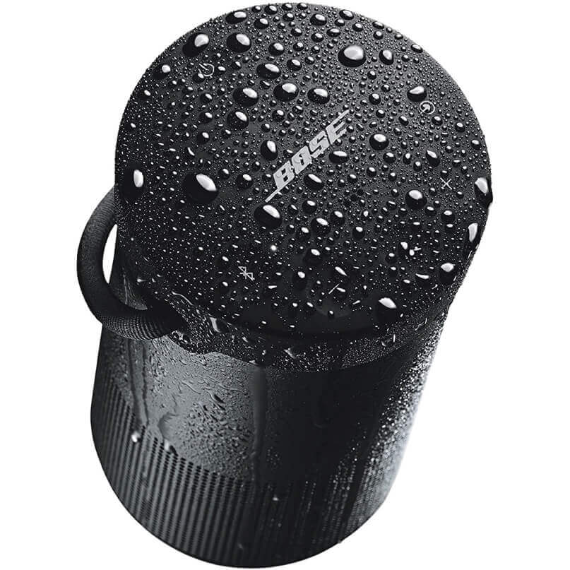 Bose Soundlink Revolve+ Bluetooth Speaker Bose portable waterproof bluetooth speaker with a round top covered in water droplets, black cylindrical body, and built-in strap.