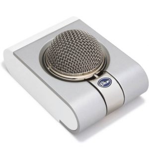 A BlueMicrophones SNOWFLAKE USB Microphone, featuring a silver finish and a spherical mesh grille with the “Blue” logo on the front, is displayed against a white background.