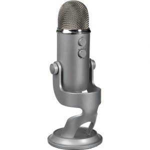 The BlueMicrophones Blue YETI Professional USB Microphone is a silver desktop condenser microphone featuring a mesh top, control knobs, and a round base, shown standing upright on a white background.