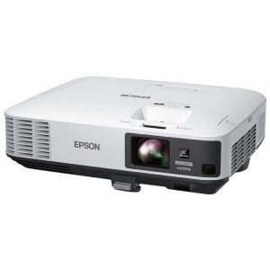 The Epson EB-2250U Mid-Range Projector features a white exterior with a lens, ventilation grilles, control buttons, and an HDMI/VGA label on the front panel.