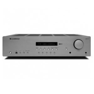 Cambridge Audio AXR85 Stereo Receiver in silver, featuring a display screen showing “FM 106.20MHz,” multiple buttons, a large volume knob, and various input ports on the front panel.