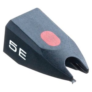 Interdyn Black phonograph stylus with red dot on top and exposed needle tip.