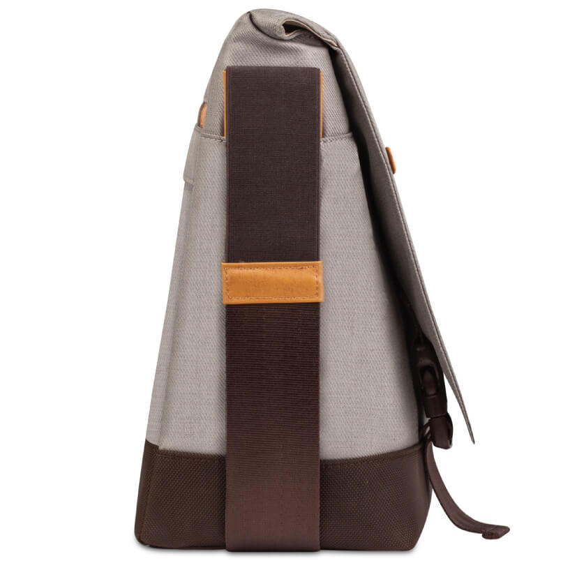 Moshi Aerio Messenger Bag 15&Quot; Beige canvas backpack with brown leather base and trim, dark brown vertical strap, side view.