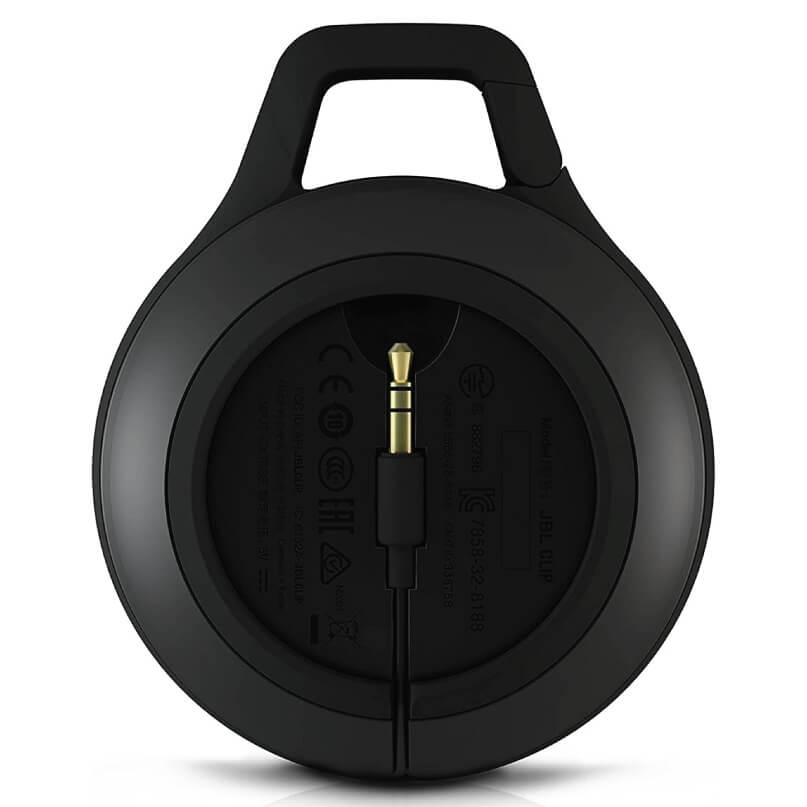 Jbl Clip+ Ipod And Iphone Speaker System Black over-ear headphones with a gold-plated 3. 5mm plug connected by a short cable, rear view.