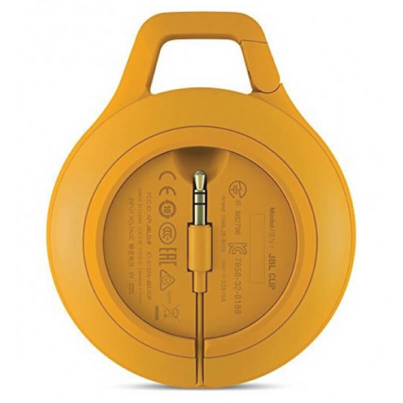 Jbl Clip+ Ipod And Iphone Speaker System Yellow circular retractable cable reel with a 3. 5mm audio jack in the center and a top carrying handle.