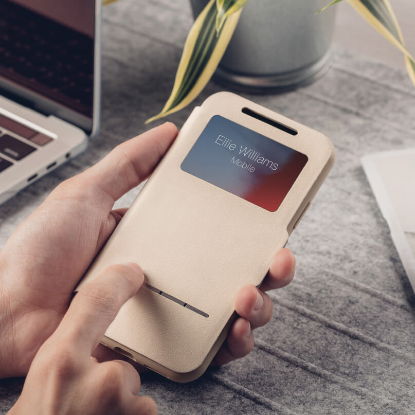 Moshi Sensecover For Iphone Xr - Blue Beige folio-style phone case with a window card slot, held in a hand.
