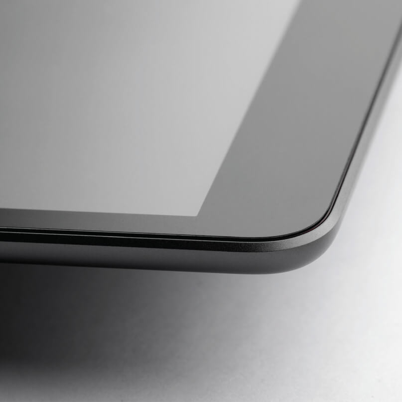 Moshi Ivisor Ag For Ipad Mini 5 - Black Close-up of a smartphone edge with glass screen and aluminum frame.