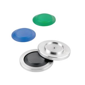 Set of round lids and caps: blue and green plastic discs and two metal caps with black inserts.
