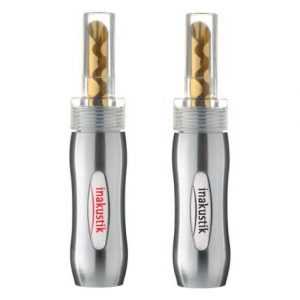 Pair of silver Inakustik connectors with transparent caps revealing gold spiral inner cores.