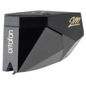 Ortofon 2M phono cartridge, black angular housing with gold 2M logo and vertical ortofon branding.