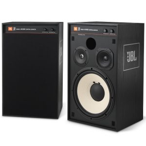 JBL 4312SE control monitor pair, with exposed drivers including a large beige woofer, midrange, and tweeter.