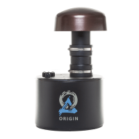 Origin branded black cylindrical device with a brown dome knob on a vertical adjustable shaft.