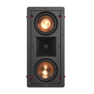 In-wall speaker with two copper-colored woofers and a central square horn-loaded driver.