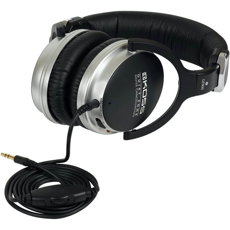 Koss Qz900 Noise Cancelling Headphoness Koss qz2000 noise-canceling over-ear headphones with silver cups, black padded headband, and wired 3. 5mm plug.