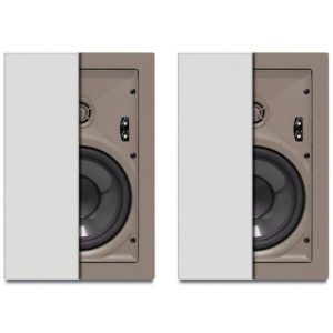 Pair of beige speaker cabinets with white grills, each exposing a large woofer.