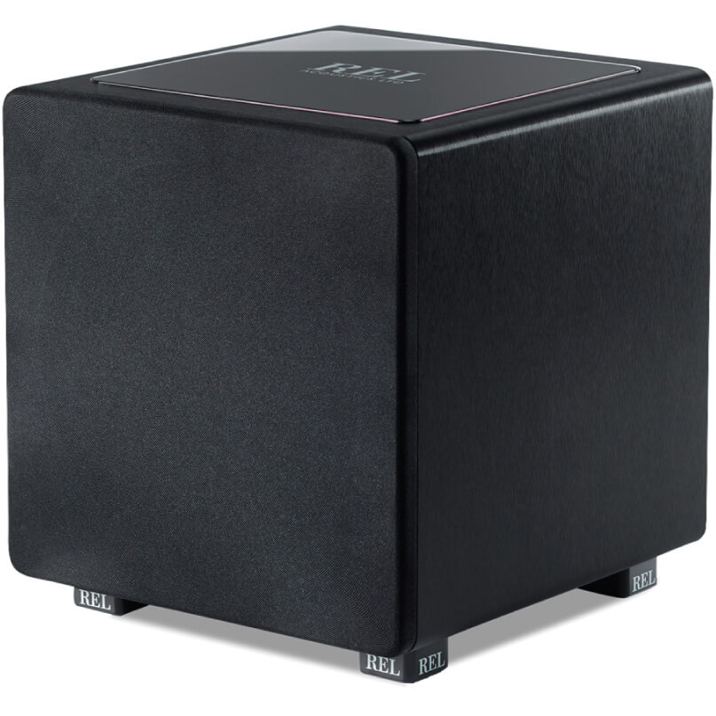Rel Ht/1205 Rel subwoofer cube with black fabric grille, top panel displaying rel logo, low-profile compact speaker enclosure.