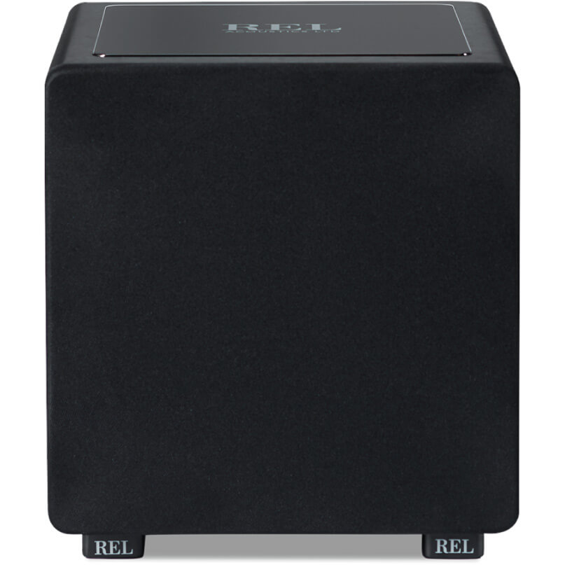 Rel Ht/1205 Rel subwoofer cube with black fabric enclosure, metal top plate, and branding on the feet.