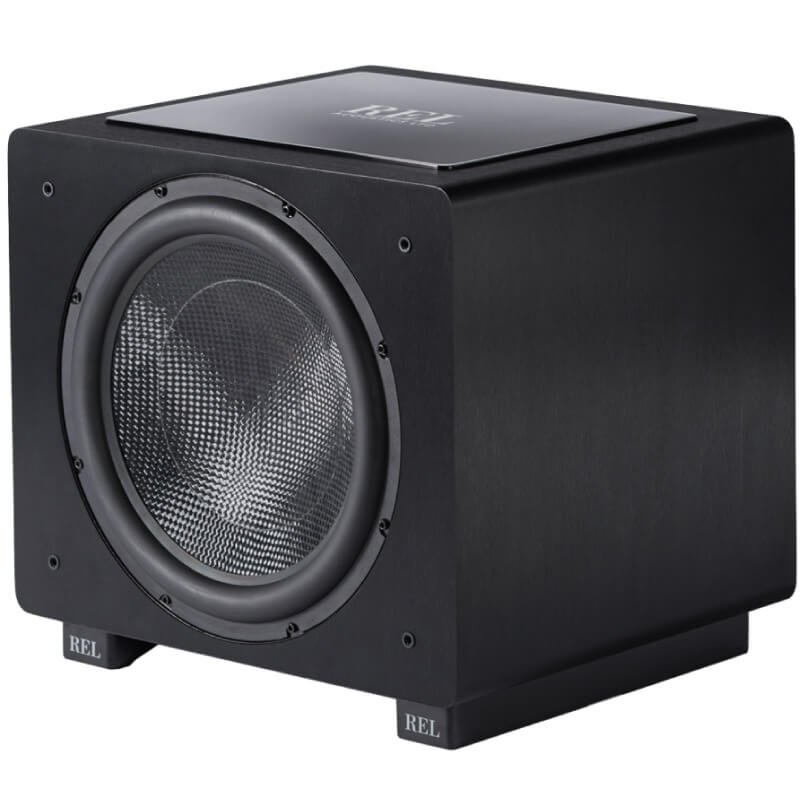 Rel Ht/1508 Rel subwoofer with a large front-facing woofer in a black enclosure and perforated grille.