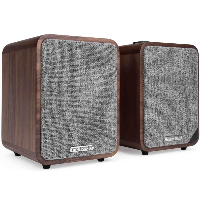 Ruark Audio Mr1 Mk2 Bluetooth Speakers Pair of markaudio wooden bookshelf speakers with gray fabric grills and walnut veneer.