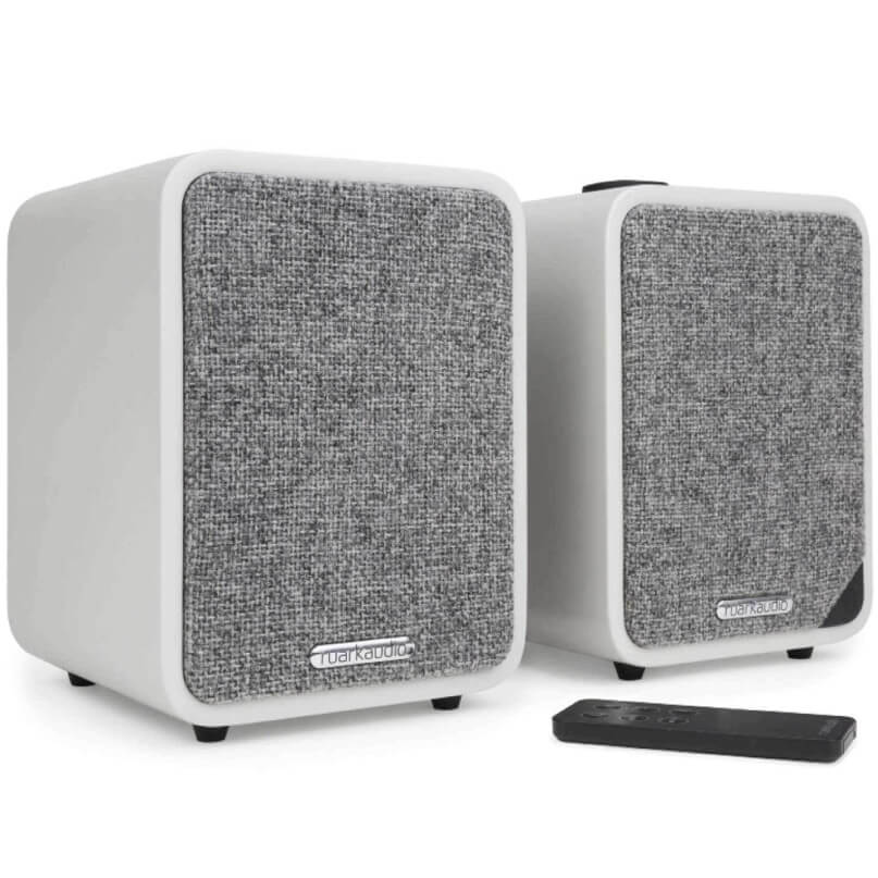 Ruark Audio Mr1 Mk2 Bluetooth Speakers Pair of white compact bookshelf speakers with gray fabric front grilles and a black remote.