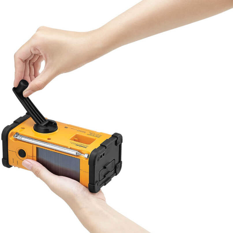 Sangean Mmr-88 Am/Fm / Handcrank / Usb / Solar Emergency Alert Radio Portable hand-crank solar emergency charger with orange housing and side solar panel.
