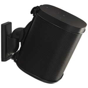 Black cylindrical wireless speaker with wall-mount bracket, metal mesh grille, and circular top control panel.
