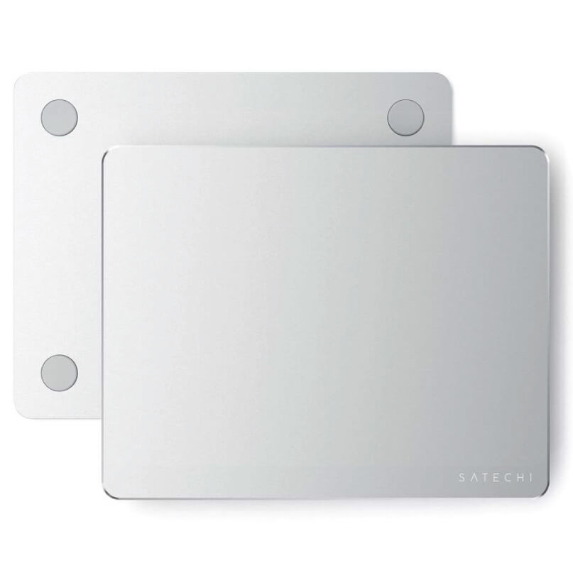 Satechi Aluminium Mouse Pad Satechi silver aluminum external ssd enclosure with rounded corners and four circular rubber feet.