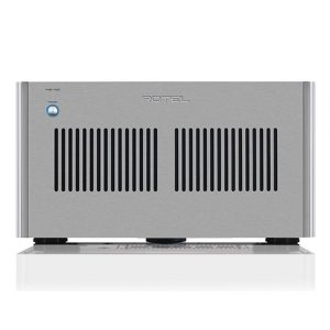 Interdyn Rotel stereo power amplifier in brushed metal case with two large vent slots and a blue power button