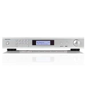 Interdyn Rotel integrated stereo amplifier with a silver faceplate, lcd display, control buttons, and a large right side volume knob