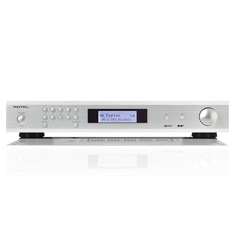 Rotel T11 Digital Radio Tuner Rotel integrated stereo amplifier with a silver faceplate, lcd display, control buttons, and a large right side volume knob