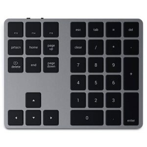External keyboard with a right-side numeric keypad and a left cluster of F-keys and navigation keys.