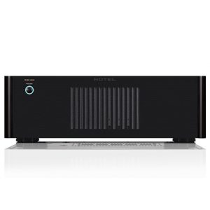 Interdyn Rotel black power amplifier with vertical vent slats, blue-ring power button, and front-panel logo.
