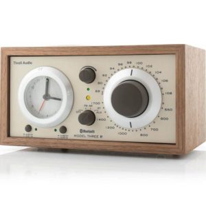 Tivoli Audio Model Three BT desktop radio with wood cabinet, large circular tuning dial, and left clock.