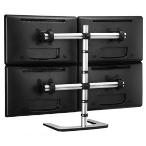 Quadruple monitor desk mount with a central chrome pole and four screens arranged in a grid.