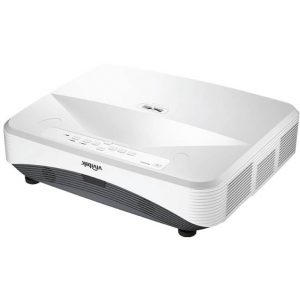 White compact home projector with top control panel and side cooling vents.
