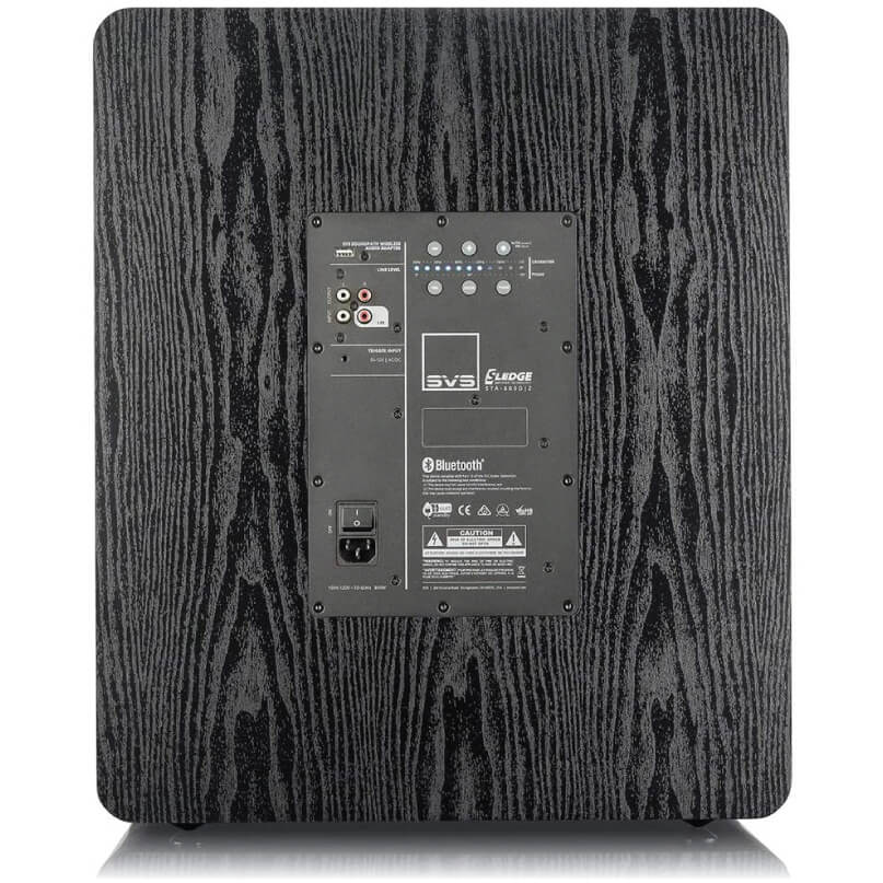 Svs Pb-3000 Subwoofer Svs subwoofer with a black wood-grain cabinet, rear control panel, bluetooth label, and power switch.