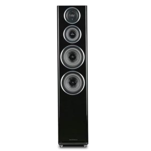 Tall black floor-standing loudspeaker with four circular drivers arranged vertically.