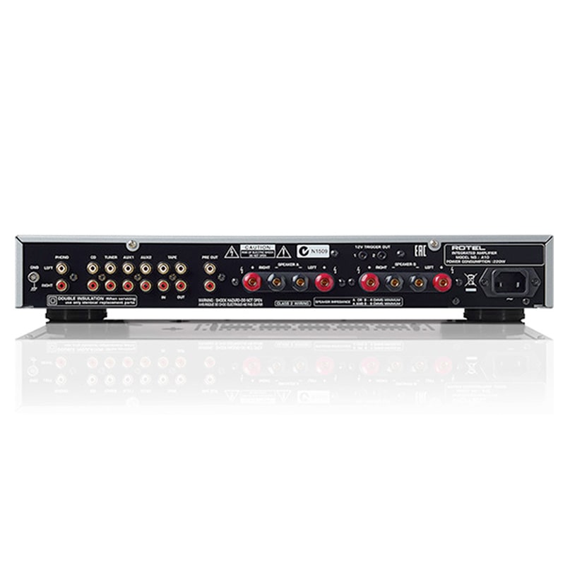 Rotel A10 Integrated Amplifier Back view of a stereo power amplifier with multiple rca inputs, dual speaker binding posts, and an iec power inlet.