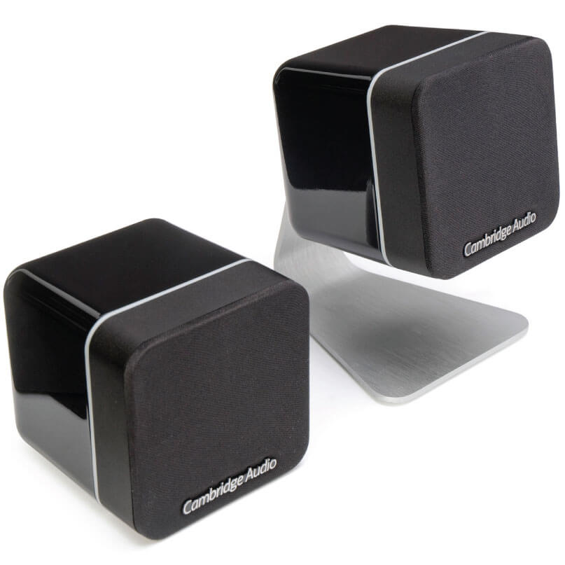 Cambridge Audio Minx Mount - Table Stand Pair of cambridge audio compact desktop speakers with black glossy enclosures, fabric grilles, and white trim.
