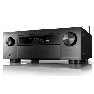 Denon AVC-X6700H network AV receiver with brushed aluminum front panel, central display, and large left and right volume knobs.
