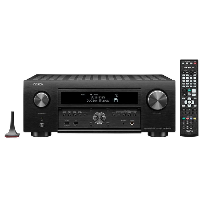 Denon Avc-X6700H Denon av receiver with front display showing blu-ray dolby atmos, large knobs on each side, remote control, and antenna.