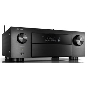 Denon Blu-ray player with brushed metal finish, two large front knobs, and a central display showing Blu-ray Dolby Atmos