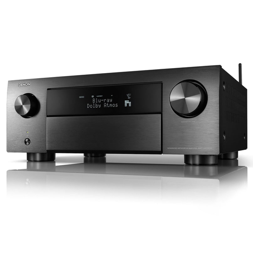 Denon Avc-X4700H Denon blu-ray player with brushed metal front, central display reading blu-ray dolby atmos, disc slot, and large side knobs