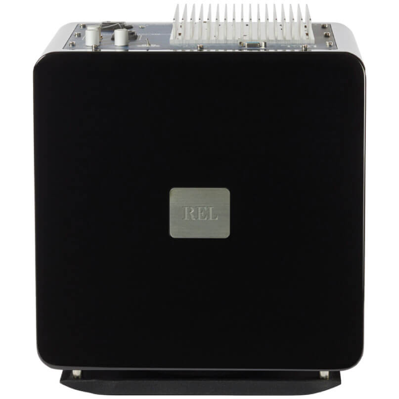 Rel Serie T/7X Rel branded square black electronic module with silver badge and top row of white pin headers